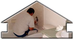 Click for larger image of Steve putting final touches on bathroom grouting on new home